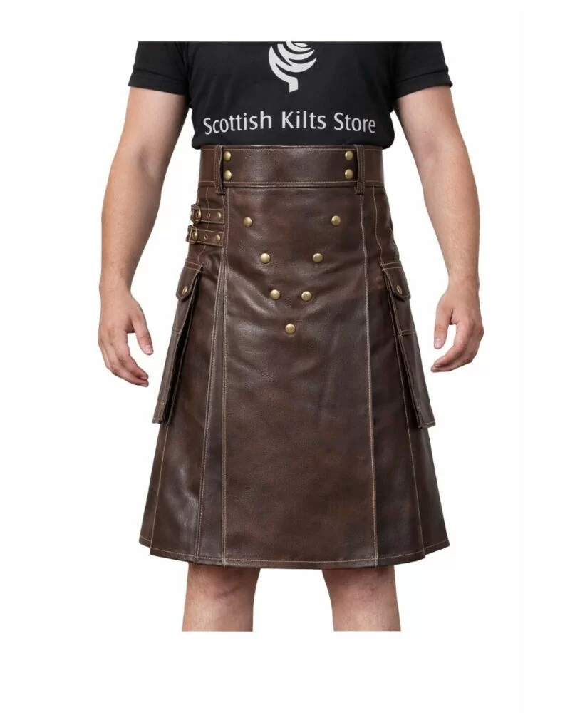 Brown leather utility kilt featuring rugged design with metal studs and adjustable straps