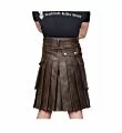 Back side brown leather utility kilt showing smooth leather finish and structured fit
